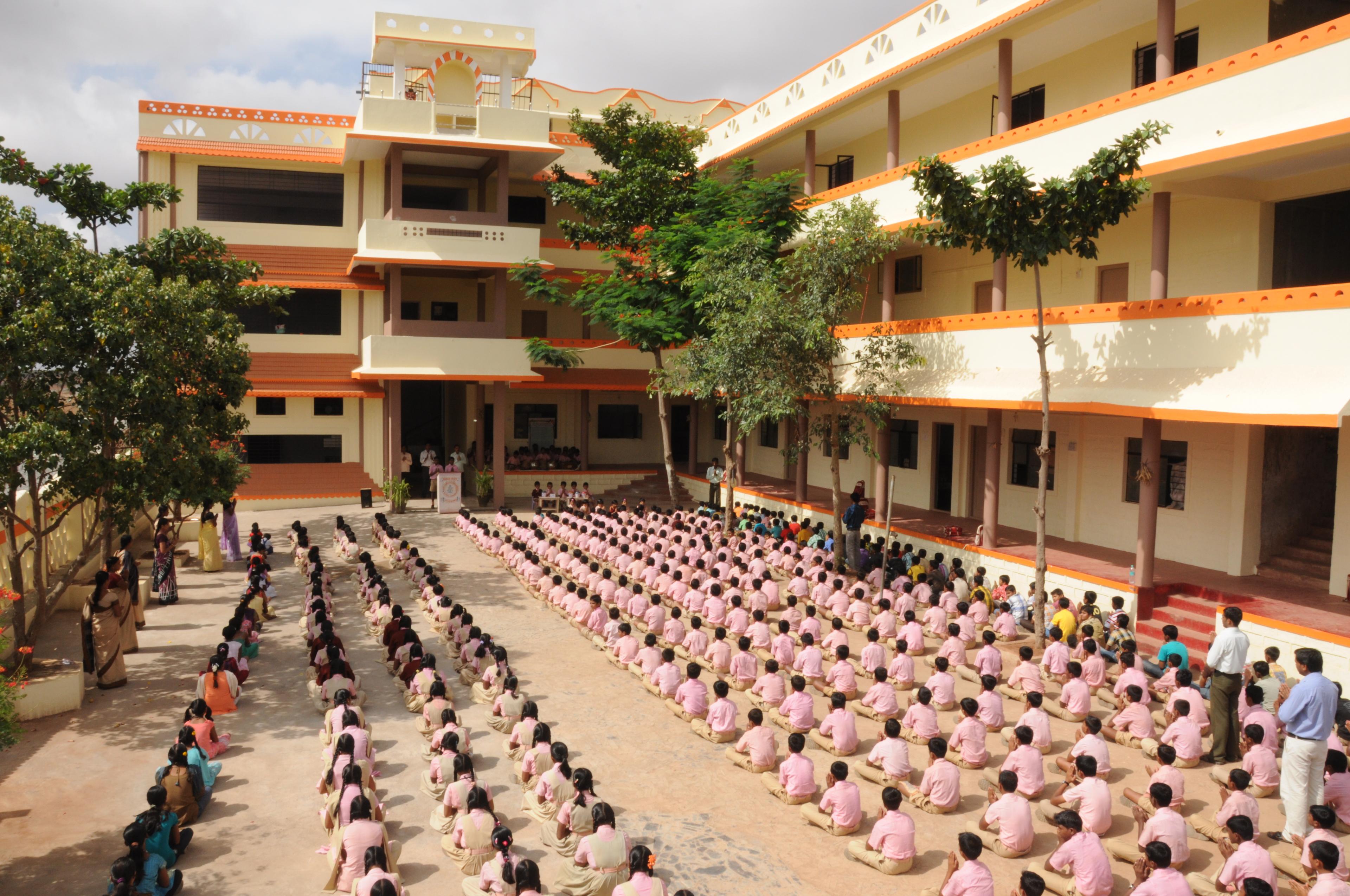 Students and management team during a school assembly