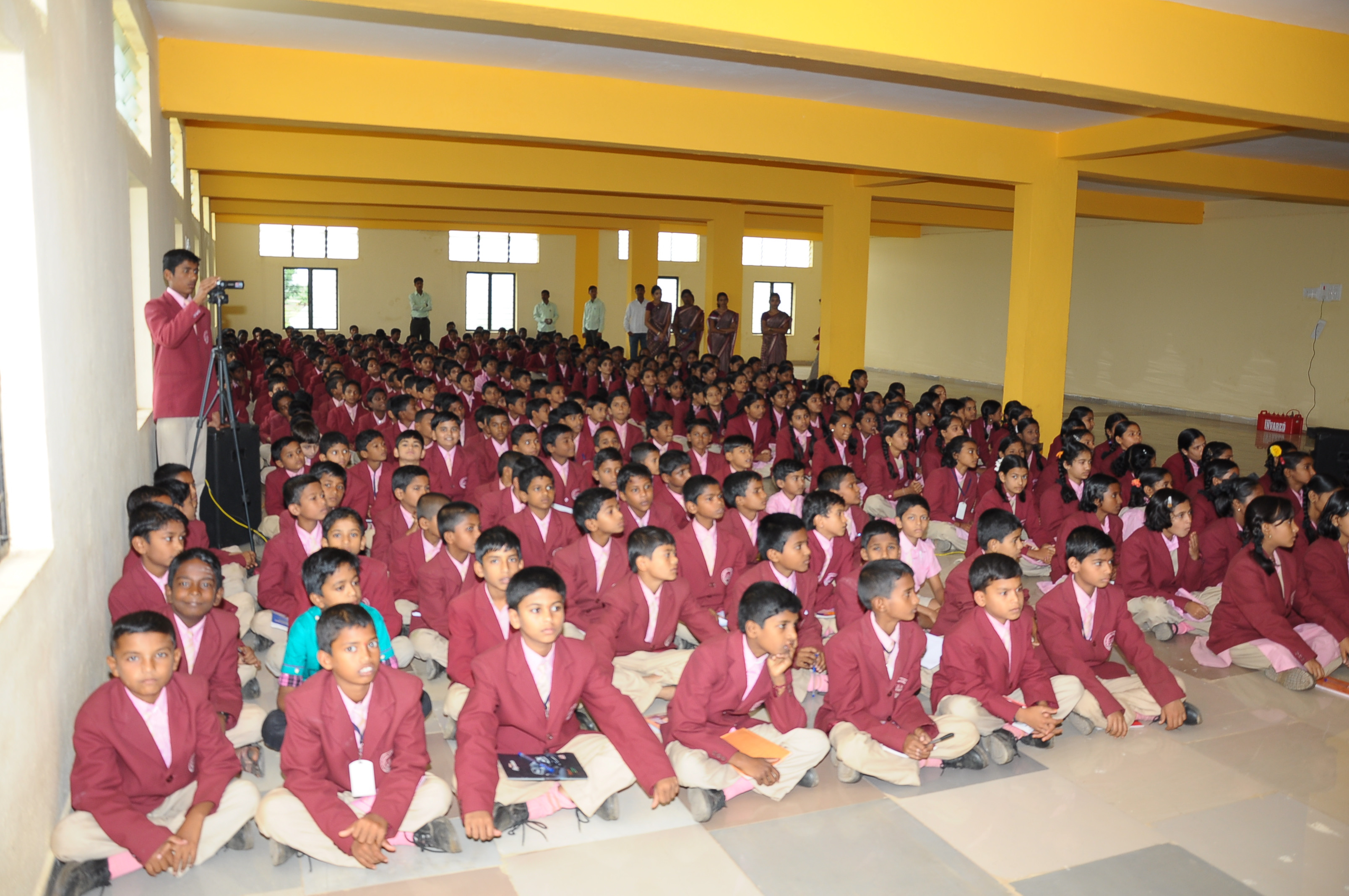 Teacher guiding students in the classroom